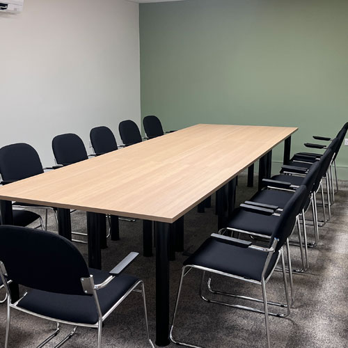 Wesley Room - a meeting room with boardroom table seating 14.
