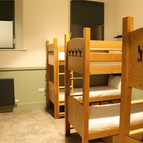 image_2026-06-15_144829785 Bedroom at Gateway Lodge with three bunk beds